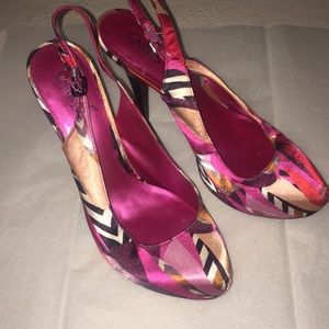 Carlos Santana sling back platform heel.